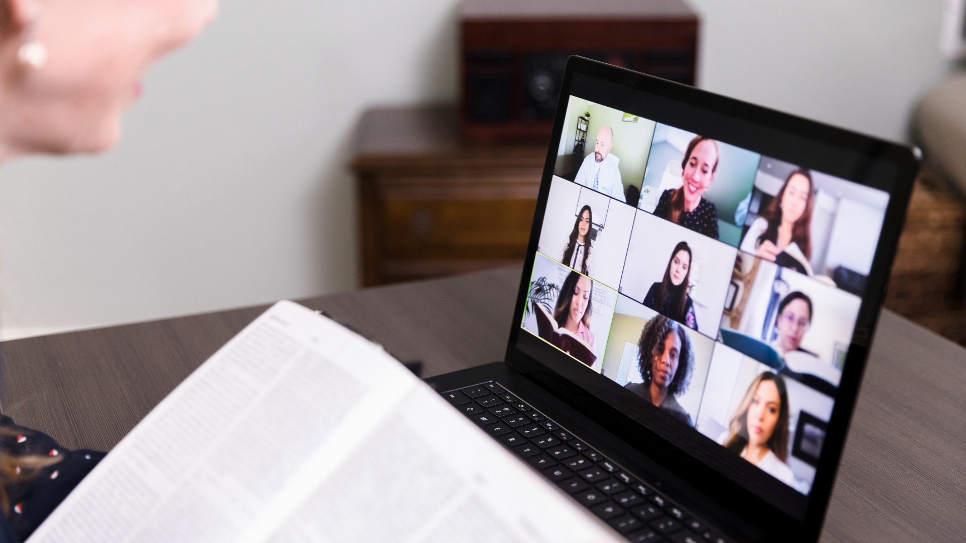 Laptop screen displaying a virtual meeting